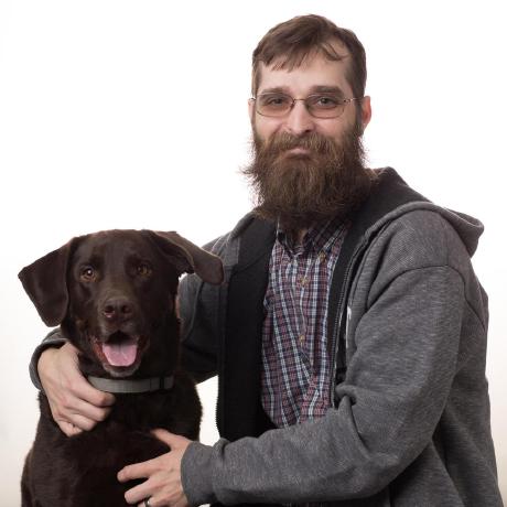 Charles Sprayberry and Nick, his Labrador Retriever